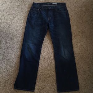 Relaxed dark-washed blue jeans